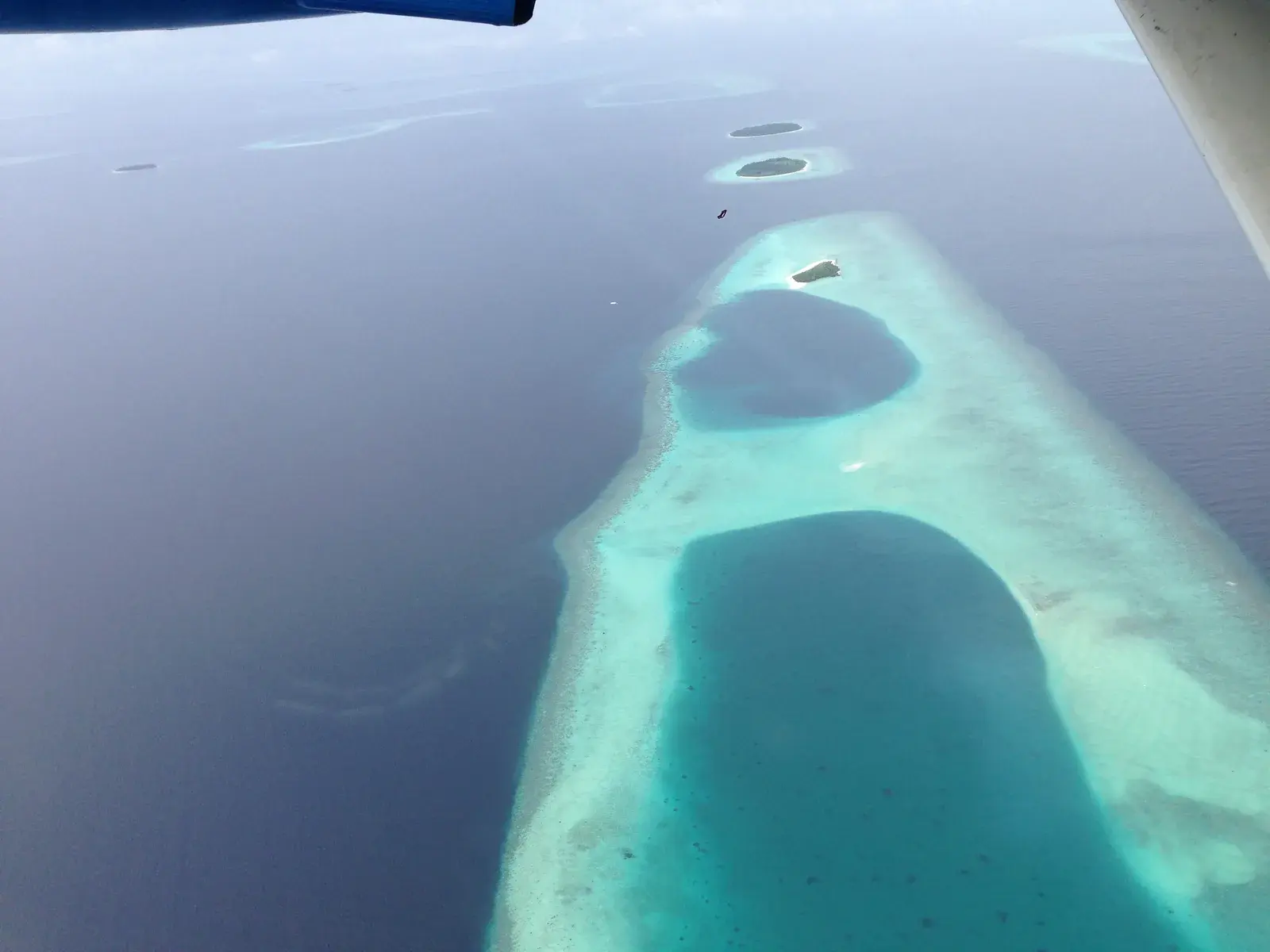 Sandbanks and shallow lagoon of Raa Atoll, Maldives, seen from the air